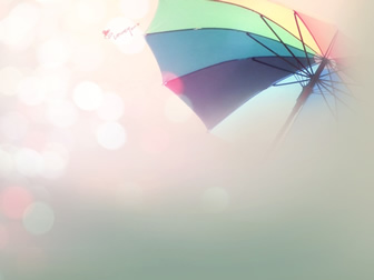 彩色雨伞 朦胧光斑ppt图片